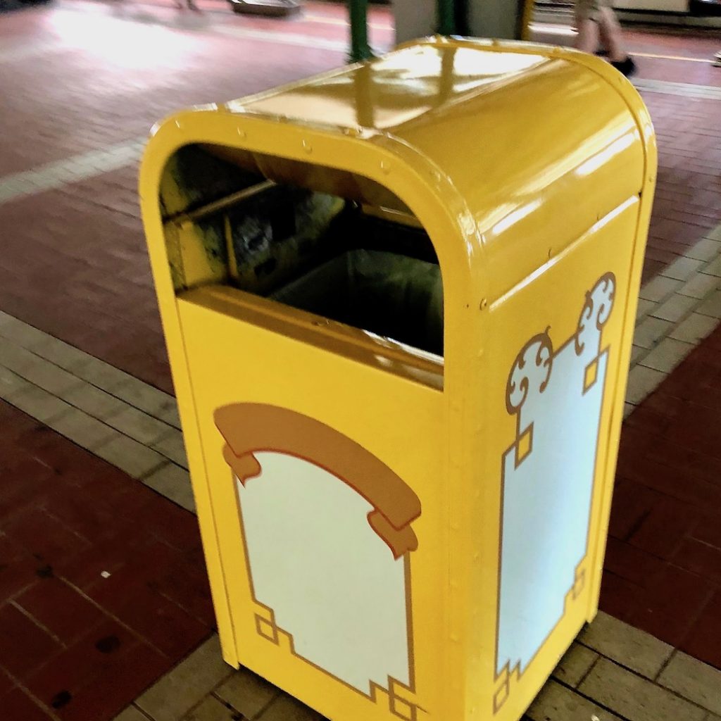 Disney trashcan with the flap removed to help prevent the spread of the corona virus.