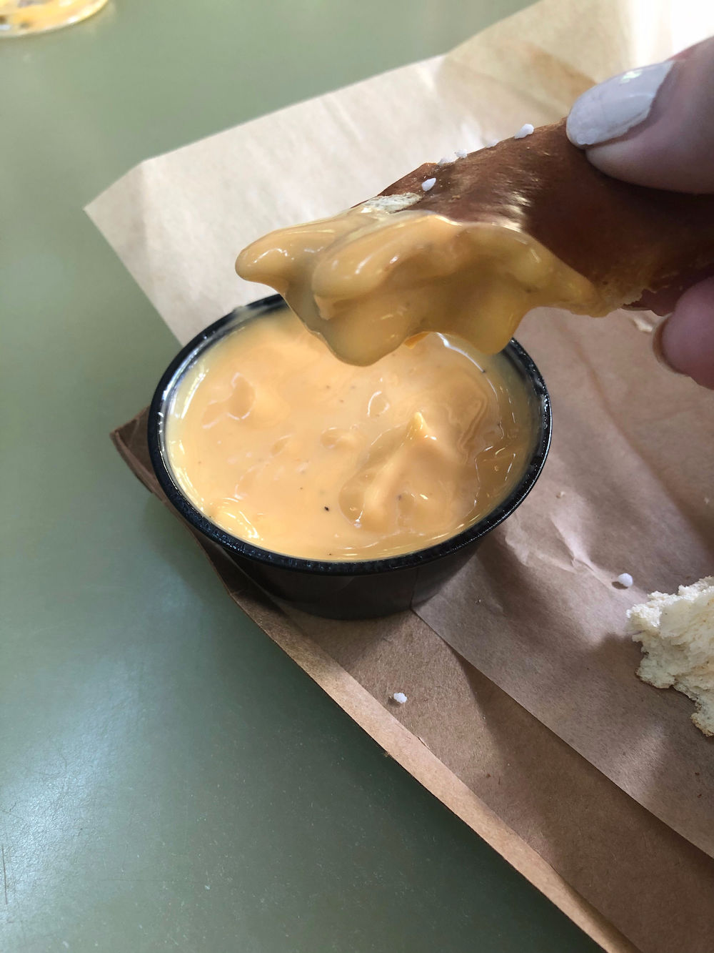 The Beer Cheese that comes with the Colossal Pretzel from Pongu Pongu. 