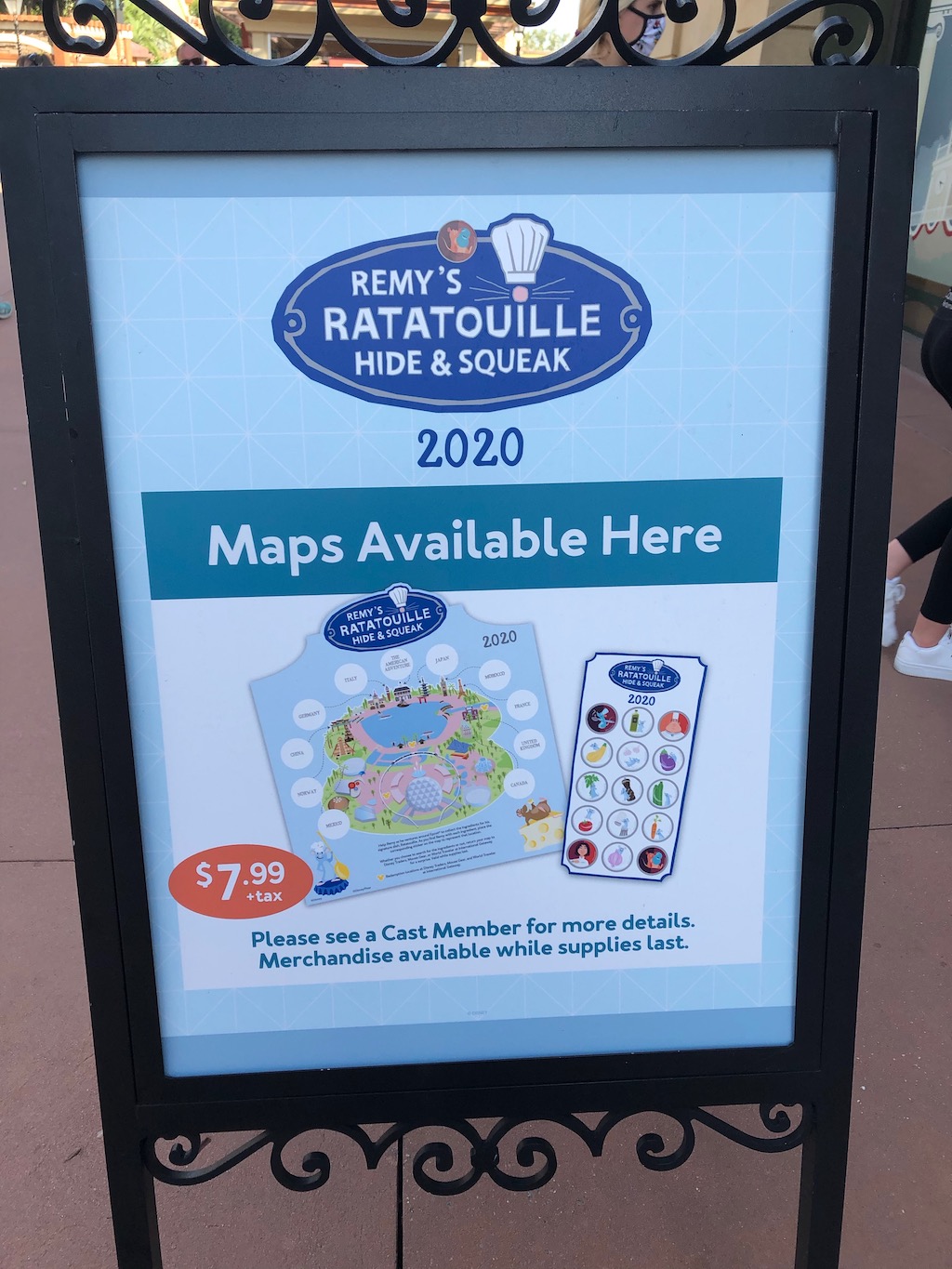 Remy's Ratatouille Hide & Squeak Sign outside of Disney Trader's in Epcot. 