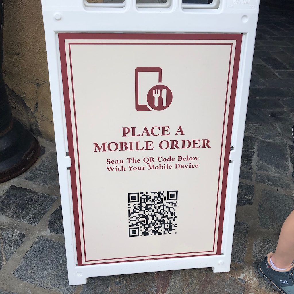 Mobile Order sign and QR code at Walt Disney World. 
