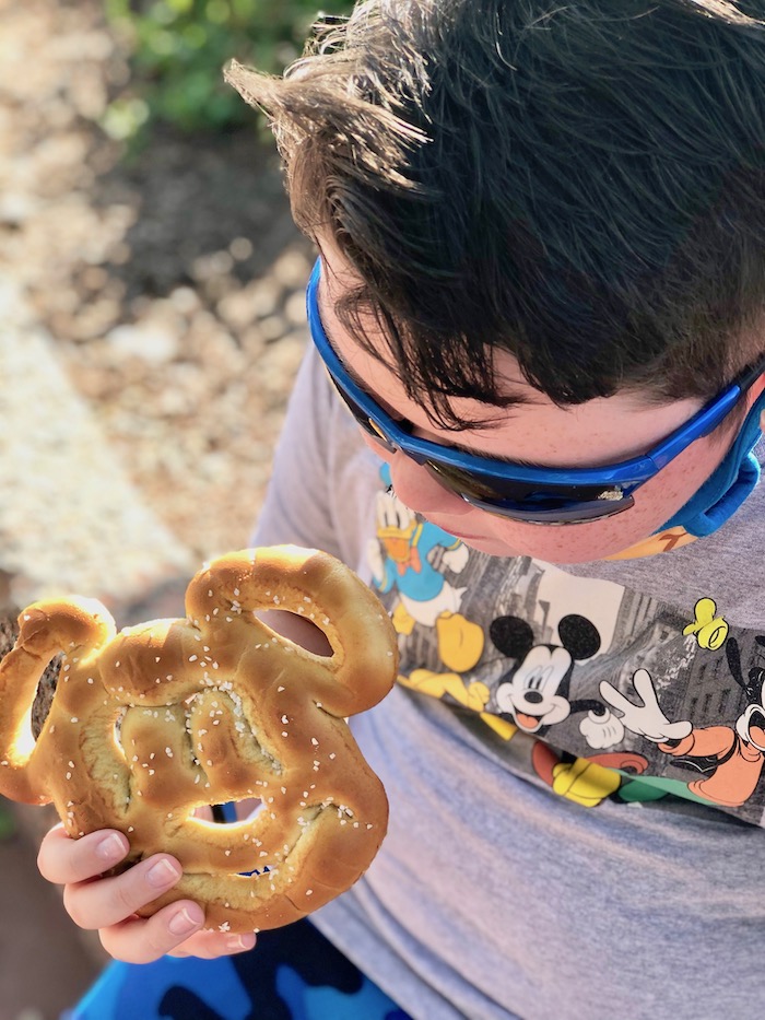 Eating a Mickey Pretzel in Epcot