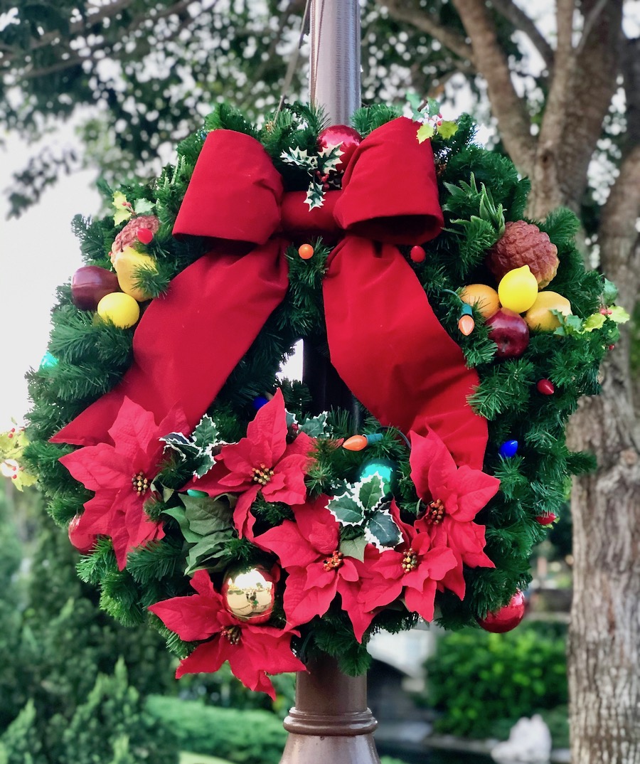 Holiday wreaths add warmth and cheer throughout Magic Kingdom