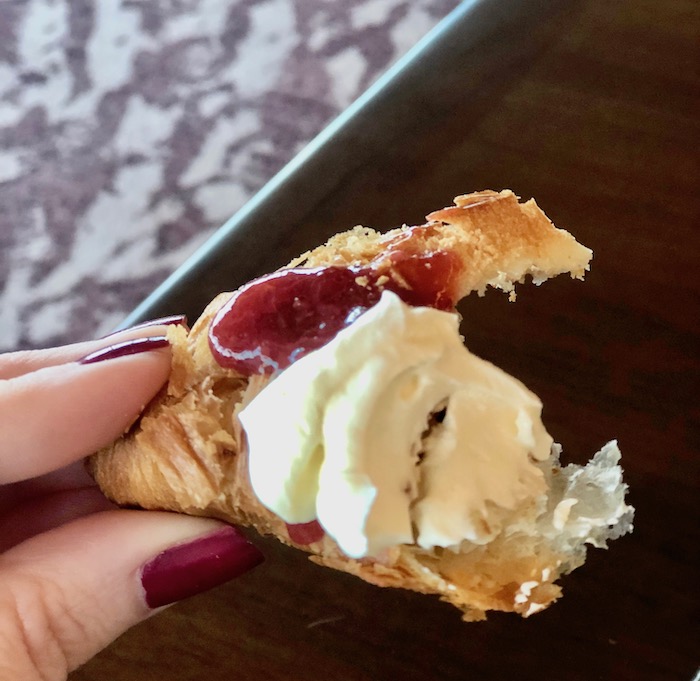 Fresh raspberry spread and whipped cream. Delicious!