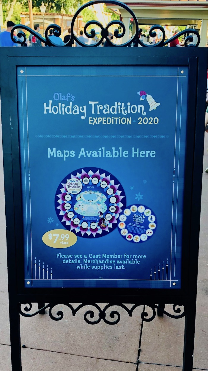 Sign outside of Disney Traders for Olaf's Holiday Tradition Expedition. 